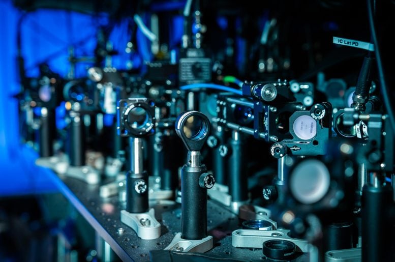 Stanford’s Light Breakthrough Could Finally Make Quantum Computers Scale Optics Lenses Mirrors in Stanford Physicist Jon Simon Lab