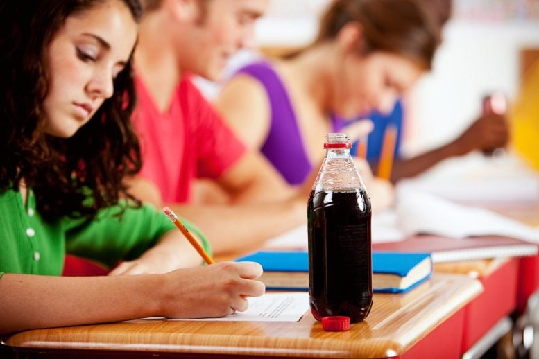 Could Sugary Drinks Be Fueling the Rise in Teen Anxiety? Girl Teen Student Soda Drink School Desk