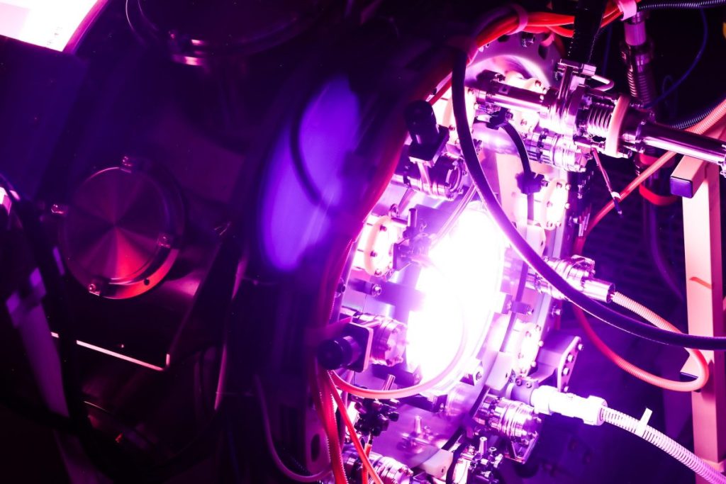 Fusion startup Helion hits blistering temps as it races toward 2028 deadline A fusion reactor glows purple.