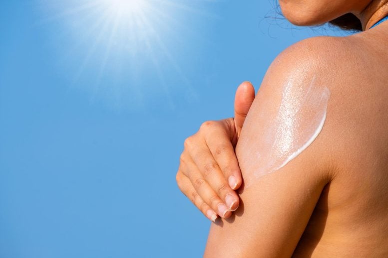 UCLA Scientists Rethink Sunscreen To Eliminate the Dreaded White Cast Woman Apply Sunscreen Summer Sun